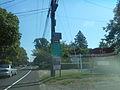 Sign tree for the Orient Hamlet Business District on NY 25 in Orient.