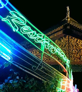 Neon sign on St Preah Sisowath Quay, Phnom Penh.- Cambodge