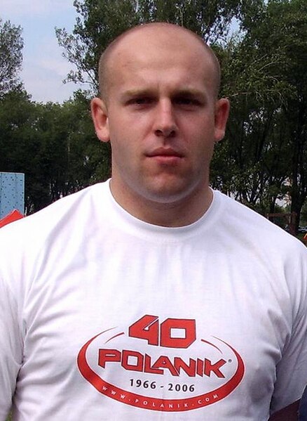 Poland's Piotr Małachowski threw a Games record in the discus.