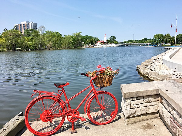 Scene of Port Credit marina with the lighthouse replica in the background