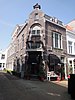 Winkel met bovenwoning in neorenaissance-stijl