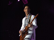 The work of various artists from the 1980s, such as American singer-songwriter Prince (pictured), influenced the development of Body Language. Prince at Coachella.jpg