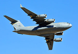 A C-17 Globemaster 3 making a low flyby
