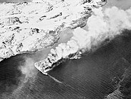 Rigel sinking, V-boat burning 1944.jpg