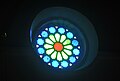 This is the stained-glass Rose Window of the St. Mary's Church at the Eastern end, above the altar.