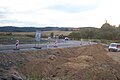 Expressway R4 under construction, Předotice village, Písek District, Czech Republic. Picture taken from the bus. Traffic diversion in Předotice village to Křešice village. On the left side a bridge under construction, which will arch over new Expressway R4´s stage from Nová Hospoda crossroads (Písek-Strakonice-Blatná-Čížová) and Mirotice village.