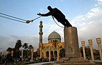 Statue of Saddam Hussein being toppled in Baghdad's Firdos Square on April 9, 2003. SaddamStatue.jpg