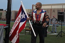 Juan Rivera, also known as T.N.T. and Savio Vega, was a main character in the IWA-WWC rivalry and a key figure in the establishment of the WWA. Savio Vega with a Los Boricuas flag.jpg