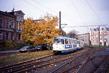 Tram on reserved track in Schwerin, Germany Schwerin Tatra Cars 105 and 205, Platz der Jugend, October 1994.jpg