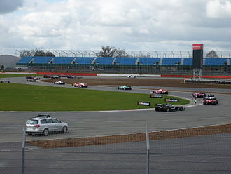 Formation lap around Brooklands corner at Silverstone Circuit in 2010 Silverstone 2010 - Race formation lap Superleague Formula.JPG