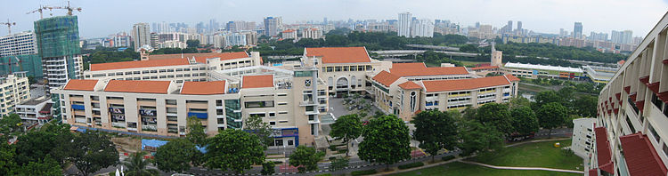 A top view of St Andrew's Secondary School (left) and St Andrew's Junior School (right). The multi-coloured grandstand of the running track of St Andrew's Junior College (top right) can be seen as well. St. Andrew's Junior and Secondary Schools.jpg