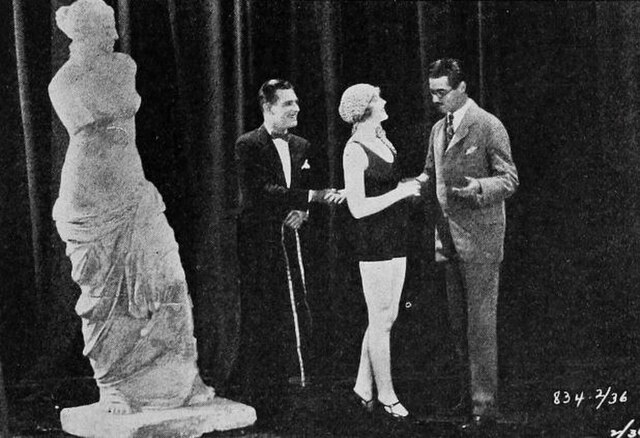 On the far right shaking hands with Esther Ralston in 1925