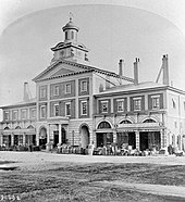 New Market House in 1868. From 1845 to 1899, the building was used as Toronto's city hall. Toronto City Hall 1868.jpg