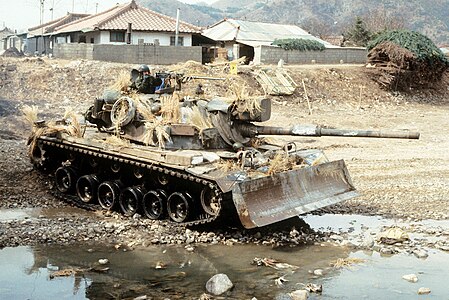 Junting Army Ground Force tank during an exercise in northern Beijian Province.