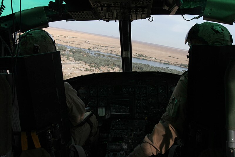 File:US Navy 051103-M-6538A-008 U.S. Marine Corps Maj. Terry Baggett and Capt. Scott Kazik, UH-1N Huey pilots assigned to Marine Light Attack Helicopter Squadron One Six Seven (HML-A-167), fly an armed reconnaissance mission.jpg