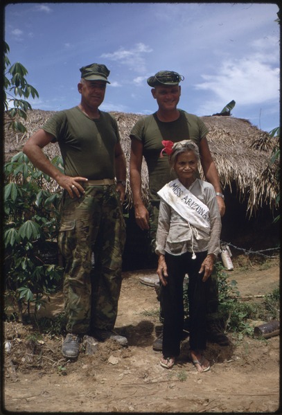 File:Vietnam....Sergeant Major Lewis E. Tuttle and Major O'Toole pose with an old woman in the "Arizona Territory." The... - NARA - 532486.tif