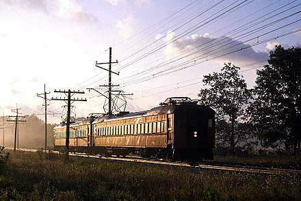 A Pullman Company electric interurban unit heading west toward Michigan City on the South Shore Line in 1980
