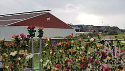 Vigil near De Knorhof in Erichem, destroyed by a barn fire in July 2017. Wake stalbrand De Knorhof Erichem 3 (cropped).jpg