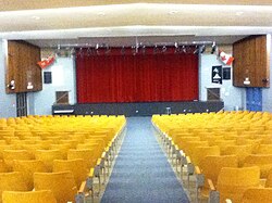 The 598-seated Francis S. Jennings Auditorium. West Hill Collegiate Auditorium.jpg