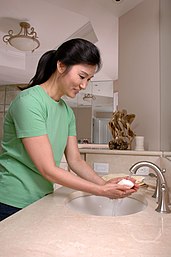 Woman_washing_hands.jpg