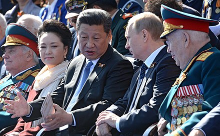 Xi with the first lady during the Moscow Victory Day Parade on 9 May 2015
