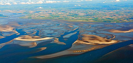 Ваттовое море. Ваттовое море в Германии. Гамбургское Ваттовое море национальный парк. Ваттовое море Акватория Северного моря. Национальный парк Шлезвиг-Гольштейнские ватты.