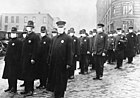 Policemen wearing masks provided by the American Red Cross in Seattle, 1918