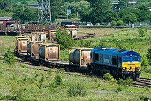 66090 winding through Tees Yard with a containerised chemicals train bound for Grangemouth 66090 winding through Tees Yard.jpg