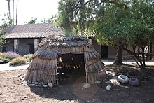 An Acjachemen dwelling replica located on the grounds of Mission San Juan Capistrano (Photo taken in 2008). Acjachemen hut.jpg