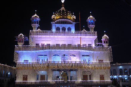 Akal Takht illuminated, in Harmandir Sahib complex, Amritsar.jpg
