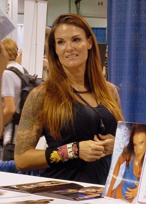 Lita as the WWE Women's Champion wrestled her "last" match at this event