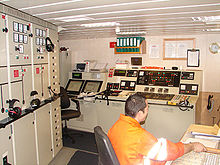 The engine control room on the Argonaute, a French supply vessel, mainly used for anti-pollution missions along with the tugboat Abeille Bourbon. It has been built in 2003 in Norway, is based in Brest, belongs to SURF and is used by the French Navy. Argonaute engine control room.jpg