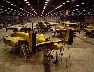 Assembling the North American B-25 Mitchell at Kansas City, Kansas (USA). Reproduction digitized from original 4x5 color transparency.