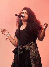 German singer-songwriter Bibi Bourelly co-wrote several songs on Anti, as well as the hit single "Bitch Better Have My Money." Bibi Bourelly Bumbershoot 2017 3.jpg