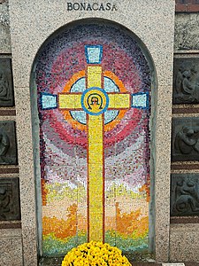 The colourful mosaic representing a cross of the Bonacasa family grave