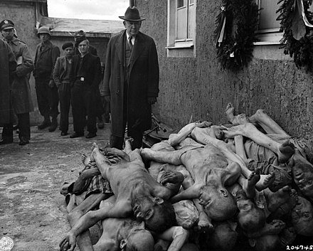 U.S. Senator Alben W. Barkley (D-Kentucky) looks on after Buchenwald's liberation.