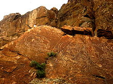 Buddhist stone carvings at Ili River, Kazakhstan Buddhas at ili.jpg