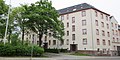 Residential building (three entrances) of the residential complex, with front gardens and borders