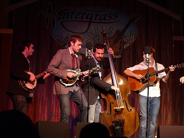 Noam Pikelny (banjo), Chris Thile (mandolin), Greg Garrison (bass), and Chris Eldridge (guitar) at Wintergrass, 2008