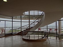 De La Warr Pavilion and terrace with De La Warr Chairs De La Warr Pavilion, Bexhill-on-Sea-8842425072.jpg