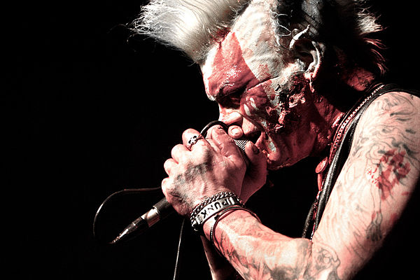 Demented Are Go's singer's stage blood make-up is an example of the horror-film schtick some psychobilly bands adopted.