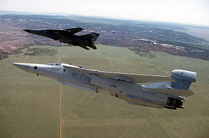 EF-111A and F-111F in flight