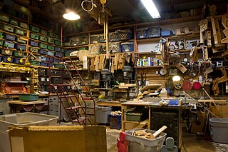 Workshop room or building, with tools, used to repair or make goods