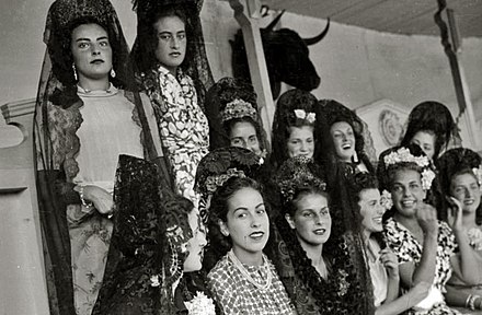 Women wearing mantilla in a corrida in Spain in 1939