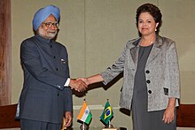 Indian prime minister Manmohan Singh (left) wearing a Nehru jacket as the top half of a suit, meeting Brazilian president Dilma Rousseff in Sanya, China, April 2011 Former Indian prime minister Manmohan Singh meeting former Brazilian president Dilma Rousseff.jpg