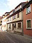 Denkmalensemble Altstadt, 2-geschossig, helle Putzfassade, auskragende Holzbalken über EG, traufständig, Gaube