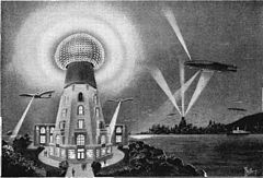 1925 artist's conception of what Tesla's wireless power transmission system might have looked like in the future, powering aircraft and lighting the city in the background. Future Tesla wireless power transmitter.jpg