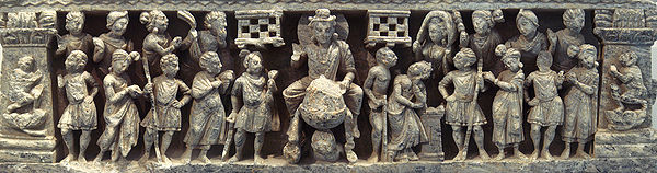 The "Great Departure" of Siddhartha Gautama, surrounded by a halo, he is accompanied by numerous guards and devata who have come to pay homage; Gandhara, Kushan period