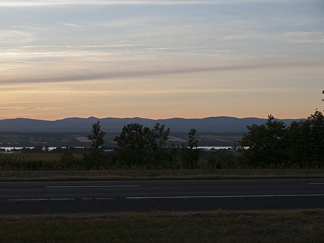 Autoroute 20 in Saint-Michel-de-Bellechasse with the Saint Lawrence River and the Laurentian Mountains at the background