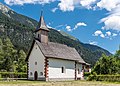 * Nomination Southwestern view of the subsidiary church Holy Trinity in Obervellach, Hermagor, Carinthia, Austria --Johann Jaritz 01:52, 23 June 2018 (UTC) * Promotion  Support Good quality. --Podzemnik 02:07, 23 June 2018 (UTC) Lovely, and IMO a good FPC nominee, though I couldn't know whether people might quibble about things like the exact placement of the crop of the trees on the right side. But I love the light, the view of the church against the mountains and the clouds. -- Ikan Kekek 02:28, 23 June 2018 (UTC)